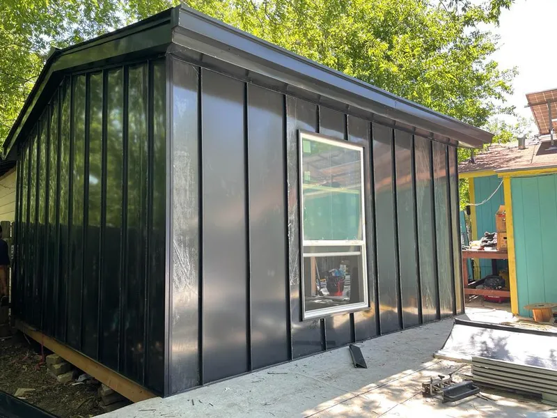 Black standing seam metal wall panels for Roof Inspection in Des Peres