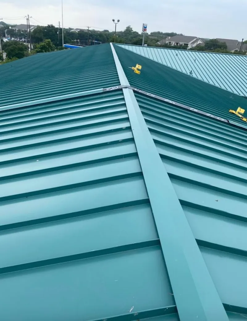 Green commercial metal roof ridge and valley for Metal Roof Repair in Des Peres